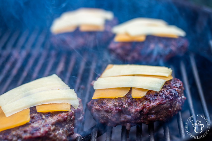 Bobby Flay put his spin on an otherwise traditional burger by adding grilled onions, horseradish mustard, and two cheeses - the double cheddar burger!