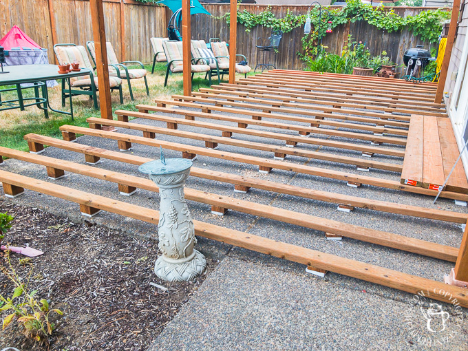 Ever thought about turning your concrete slab into a covered deck? It's definitely doable! Here are some thoughts, tips, & photos from our experience!