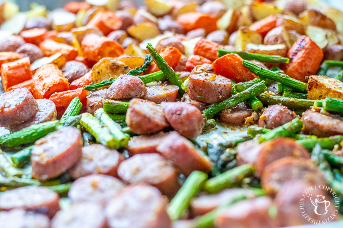 This recipe for one pan chicken sausage with roasted asparagus and potatoes is easy, healthy, kid-friendly, and can be prepared a bit ahead of time!