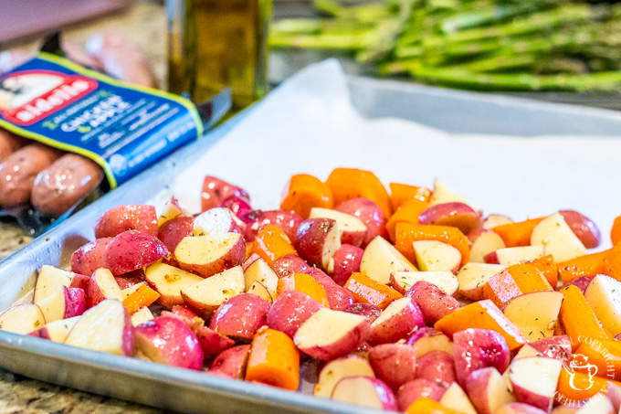 This recipe for one pan chicken sausage with roasted asparagus and potatoes is easy, healthy, kid-friendly, and can be prepared a bit ahead of time!