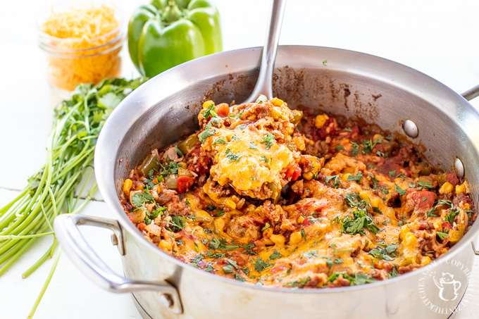 Busy family? This One Pan Spanish Rice Bake is for you. Other than the produce, it's a pantry meal, and it also comes together in a single pot!