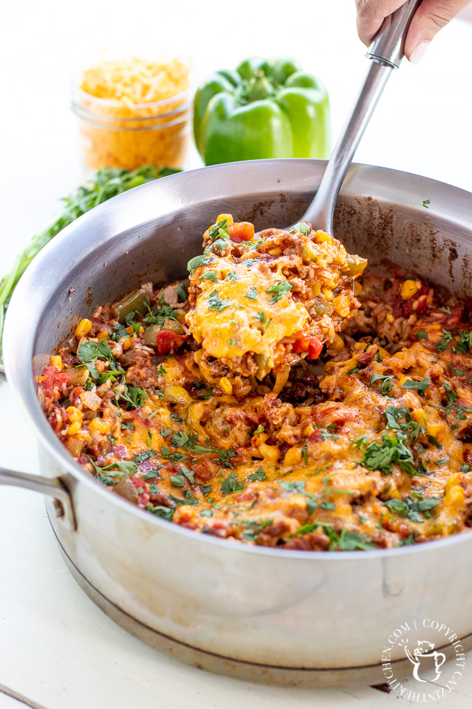 Busy family? This One Pan Spanish Rice Bake is for you. Other than the produce, it's a pantry meal, and it also comes together in a single pot!